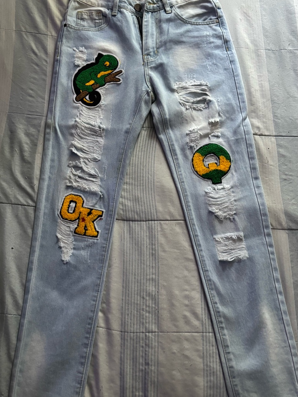 Light Blue Men’s Ripped Jeans with Green & Yellow Patches